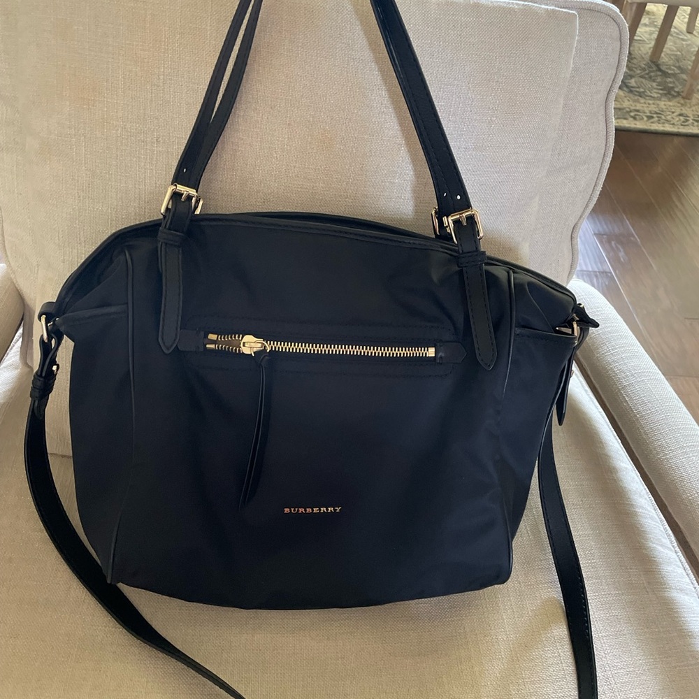 Burberry Diaper bag with changing pad. Great condition, gold hardware.